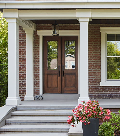 Professional door replacement on a Mississauga home exterior